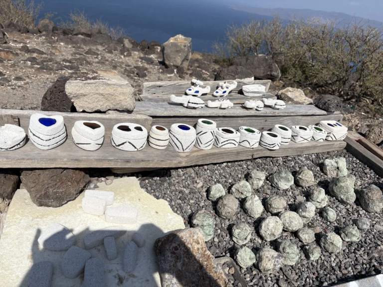Lake Assal is a crater lake located in the Danakil Desert in central Djibouti, surrounded by dormant volcanoes and black lava fields that contrast with its emerald waters. At more than 153 meters below sea level, it holds the distinction of being the lowest point in Africa.