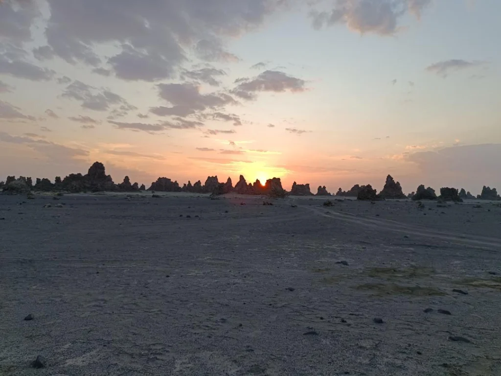Package - Djibouti - lac abbe - lac assal - ditilou village 1 Lac Abbé is a remarkable salt lake located on the border between Djibouti and Ethiopia. Lac Abbé is a destination like no other a surreal masterpiece of nature waiting to be explored.